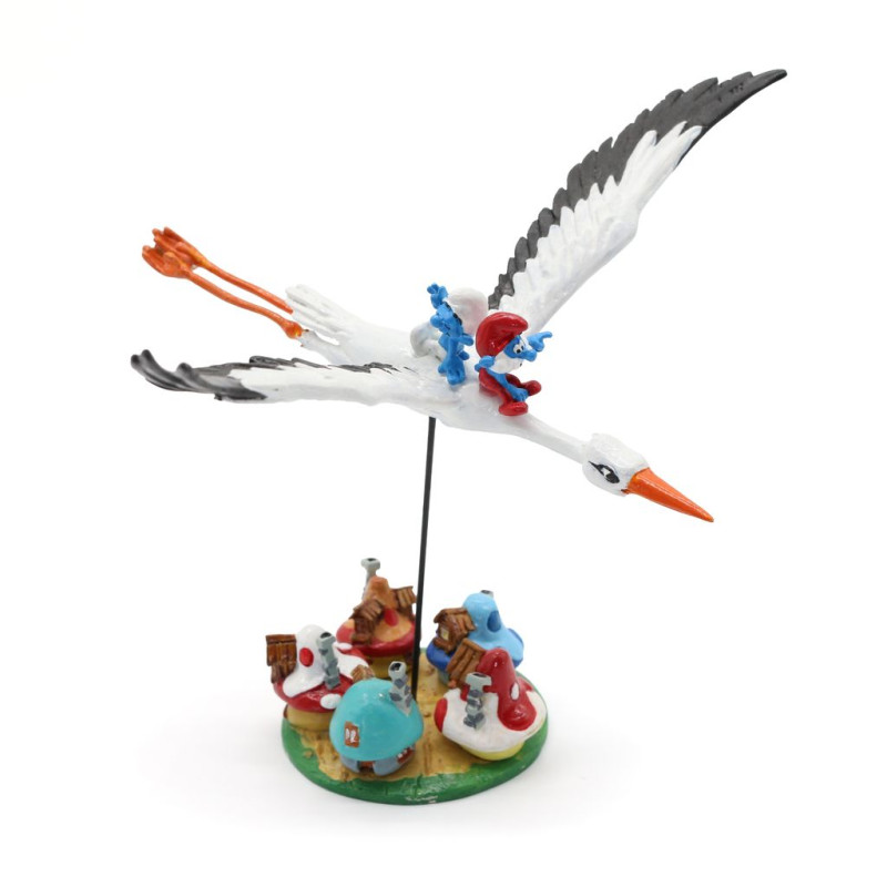 LES SCHTROUMPFS ET LA CIGOGNE SURVOLANT LE VILLAGE FIGURINE PIXI 11 CM